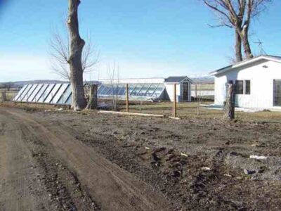 Earth-Sheltered Backyard Greenhouse Image